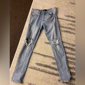 Purple Jeans. Dropped fit midrise with slim leg. Size 30